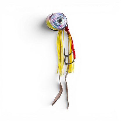 Ocean Angler Slider fishing lure with a reflective eye, yellow silicone skirt, and heavy-duty assist hooks.