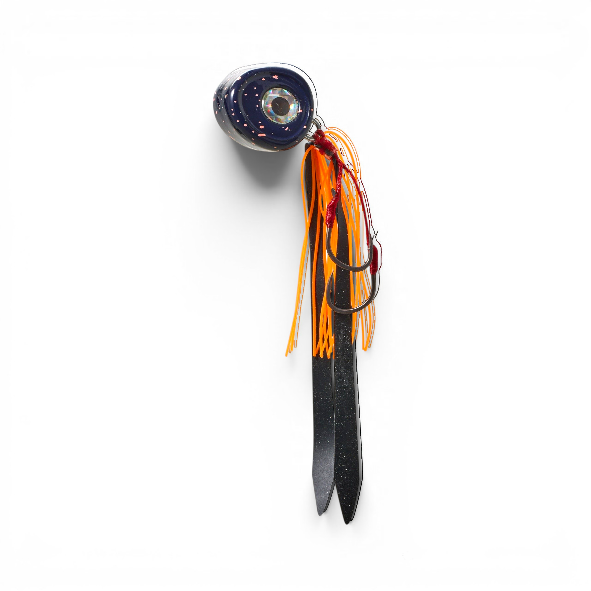 Ocean Angler Slider fishing lure with a dark speckled head, orange silicone skirt, and sharp assist hooks.