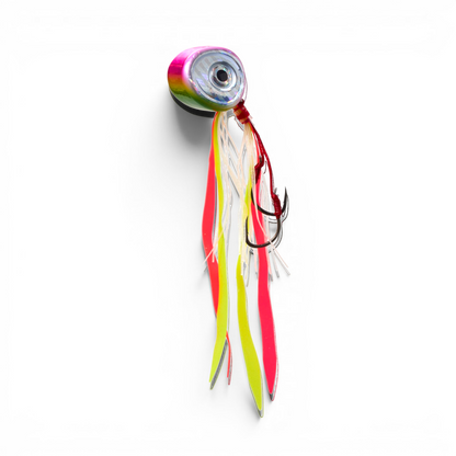 Ocean Angler slider fishing lure with a pink and green head, reflective eye, and vibrant multi-colored skirt tails.